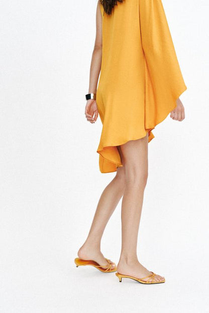 Robe asymétrique à boucle