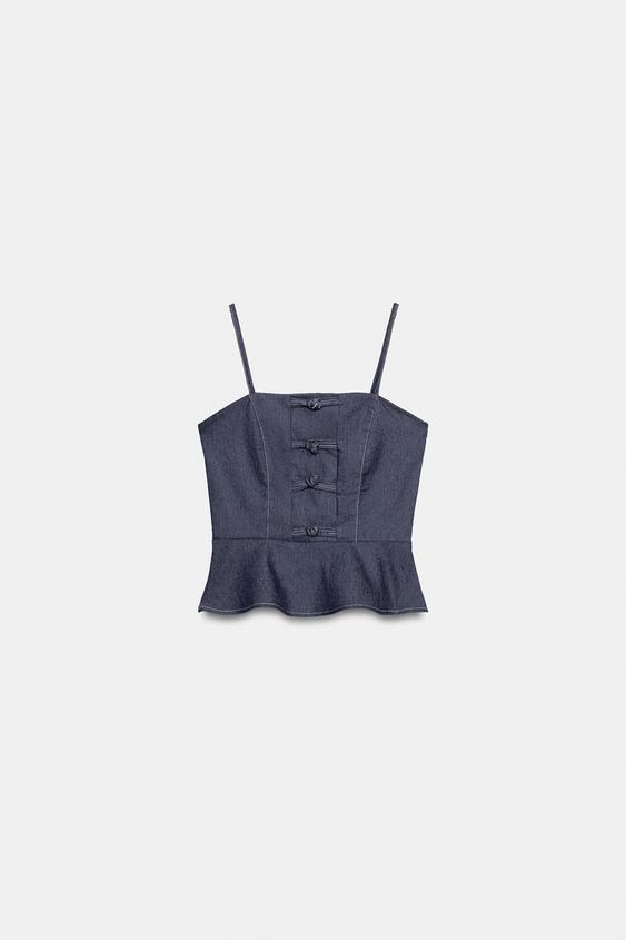 Top peplum à brandebourgs