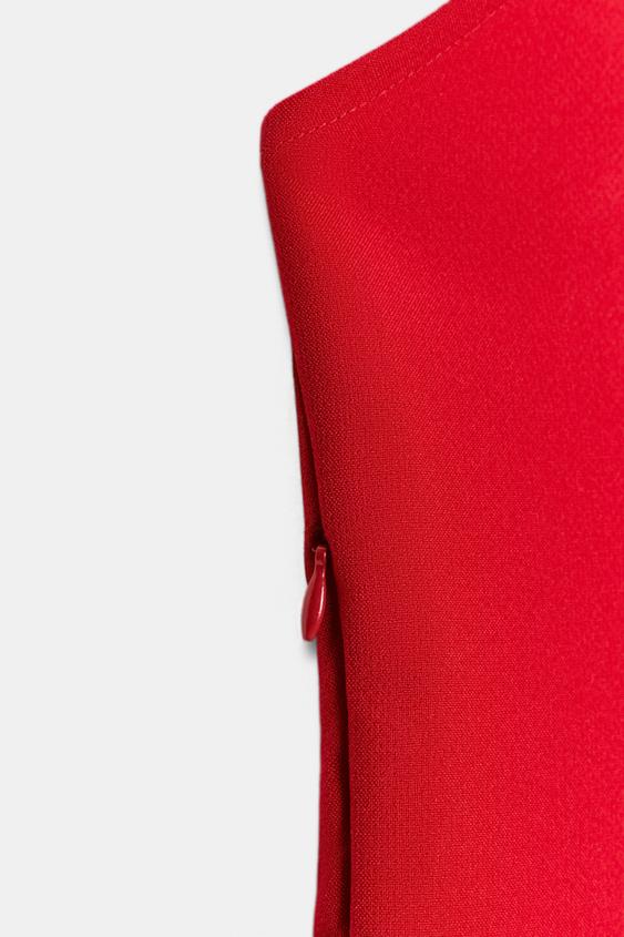 Top dos-nu peplum