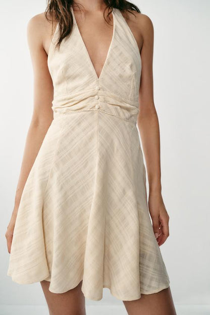 Robe courte texturée dos-nu