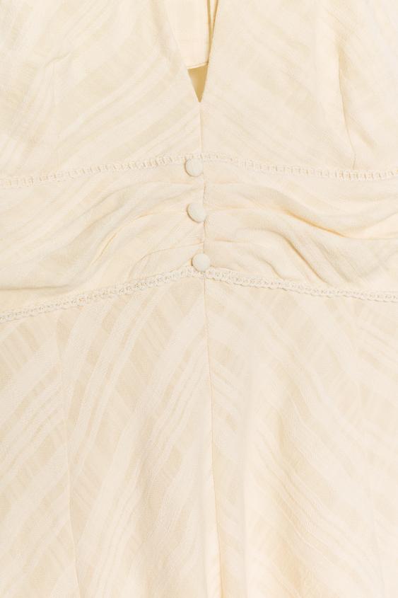 Robe courte texturée dos-nu