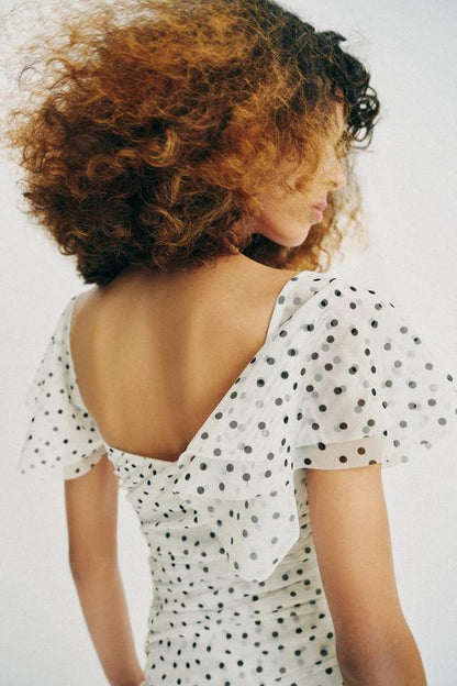 Robe midi à pois