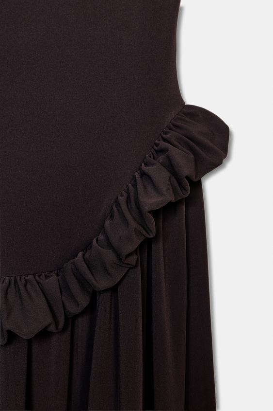 Robe peplum à volume