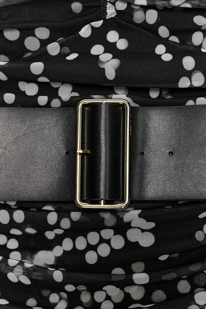 Robe à pois avec ceinture