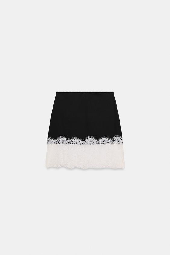 Jupe mini contrastée en dentelle