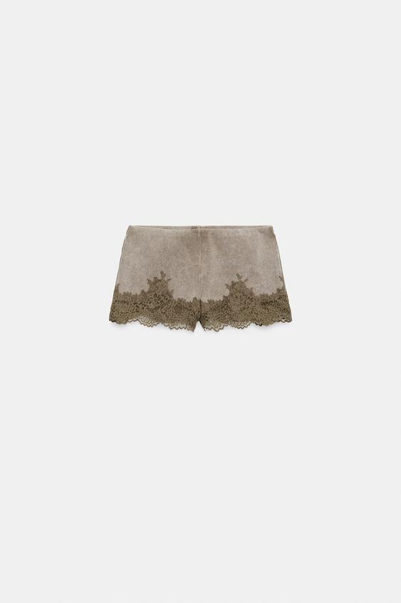 Short effet délavé en dentelle