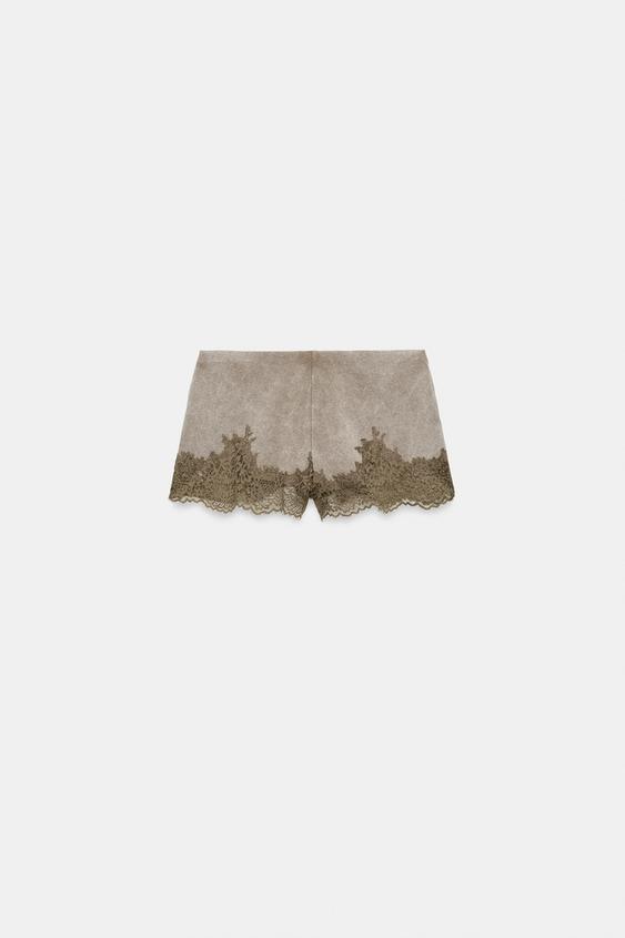 Short effet délavé en dentelle