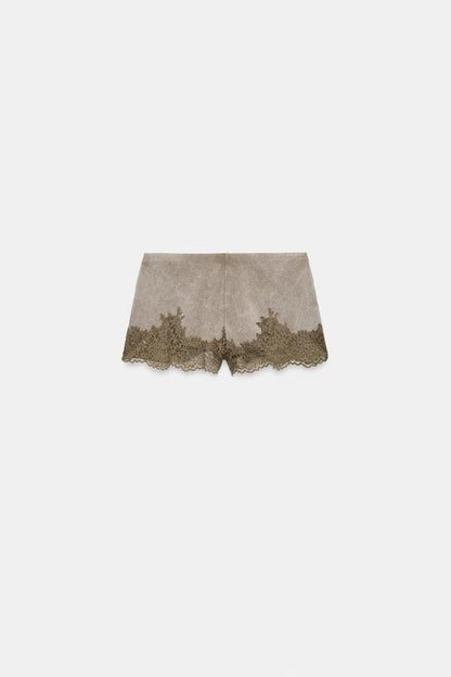 Short effet délavé en dentelle