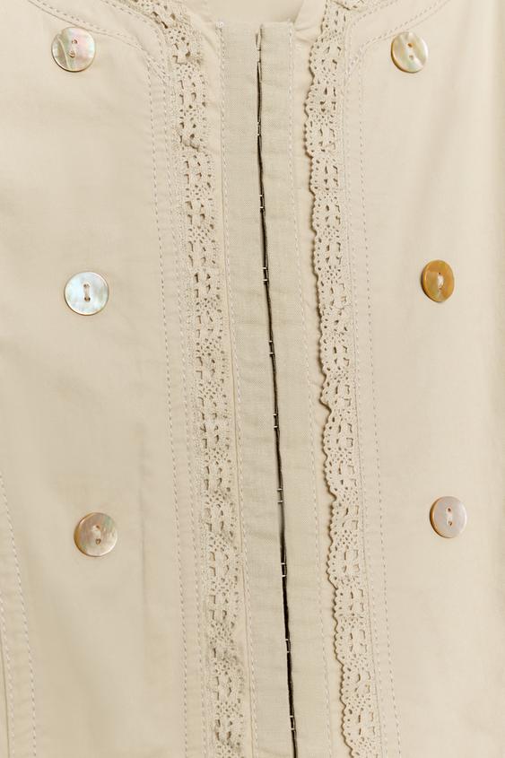 Veste à boutons contrastée en dentelle