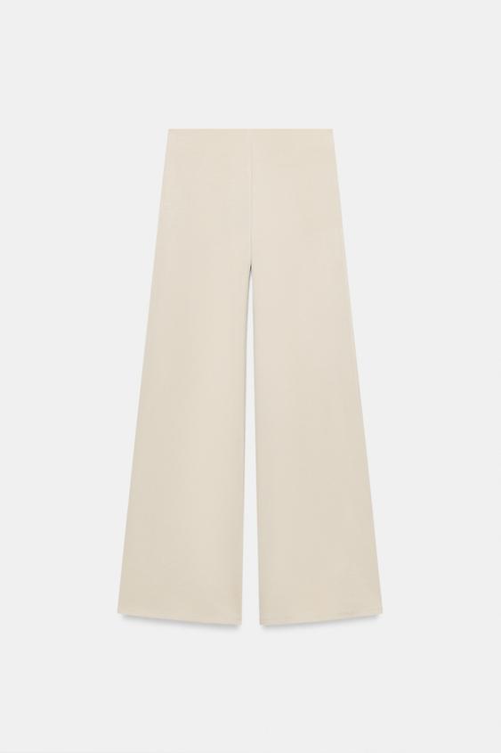 Pantalon droit piqué à boutons