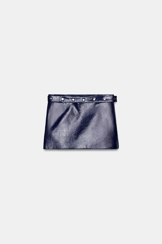 Jupe mini effet cuir à clous