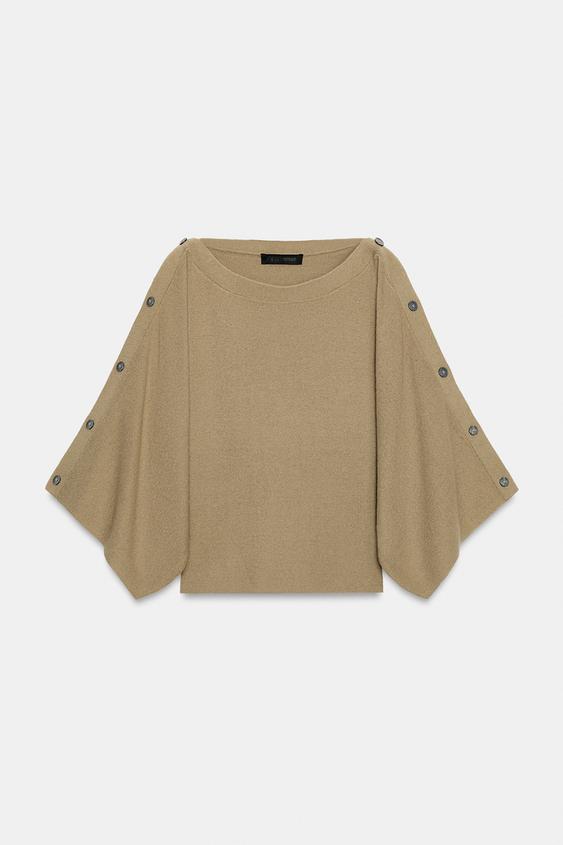 Pull en maille à manches cape et boutons