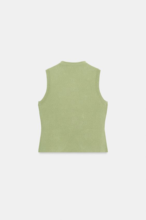 Gilet en maille à brandebourgs