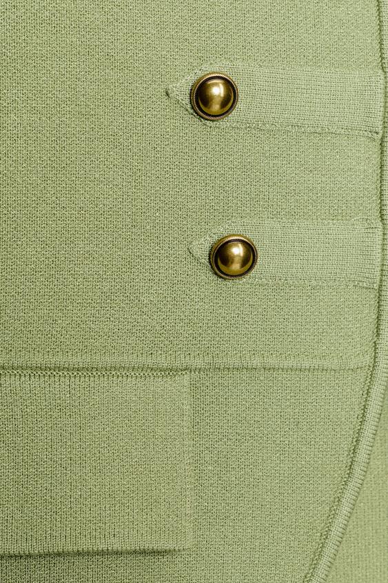 Gilet en maille à brandebourgs