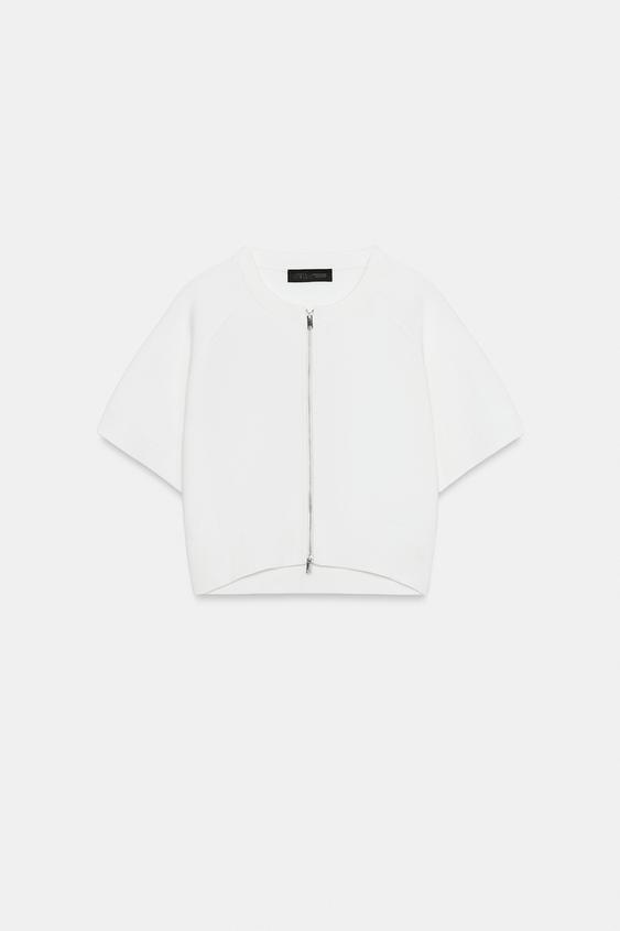 Veste courte en maille à fermeture zippée