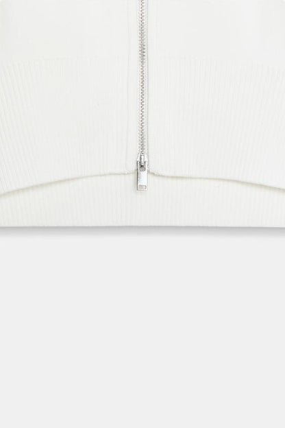 Veste courte en maille à fermeture zippée