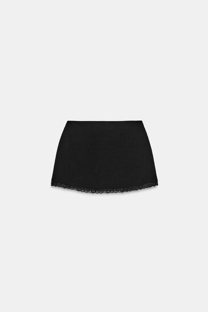 Jupe mini extensible en dentelle