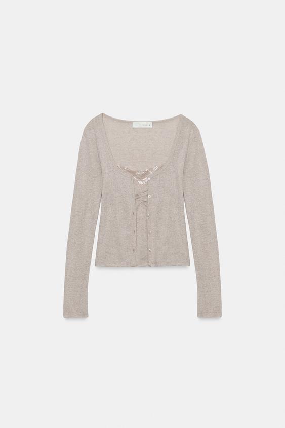Veste contrastée avec top en dentelle