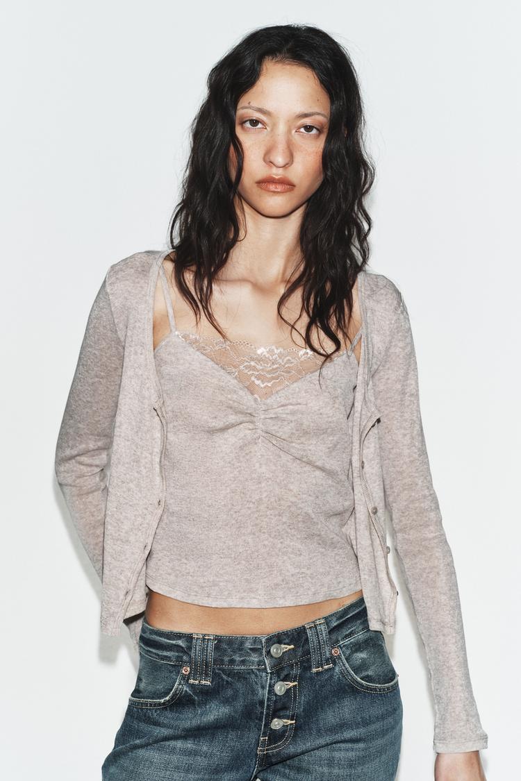 Veste contrastée avec top en dentelle