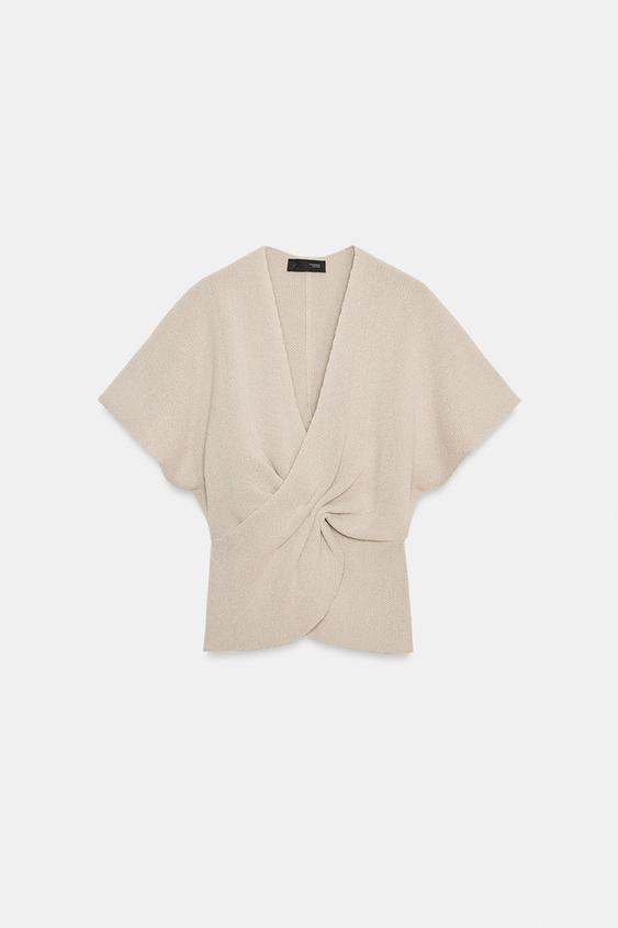 Top en maille avec nœud