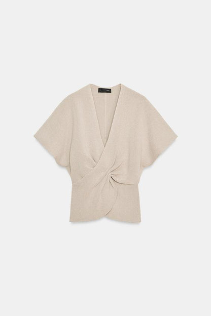 Top en maille avec nœud