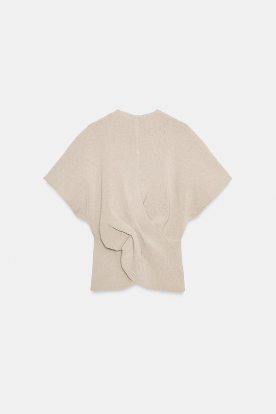 Top en maille avec nœud