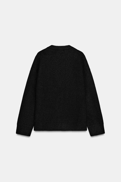 Pull uni en maille à col V