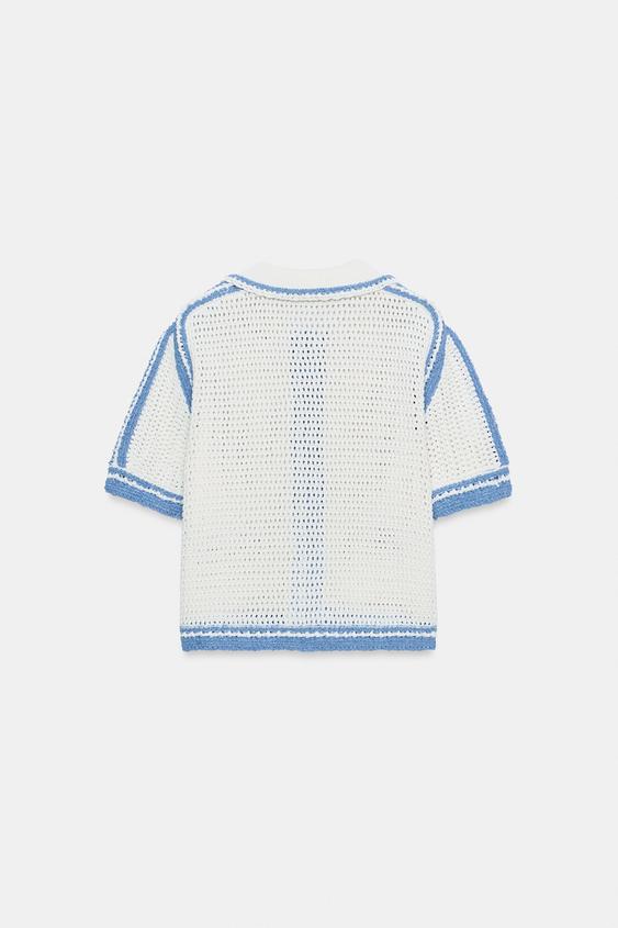 Veste en maille ajourée à manches courtes