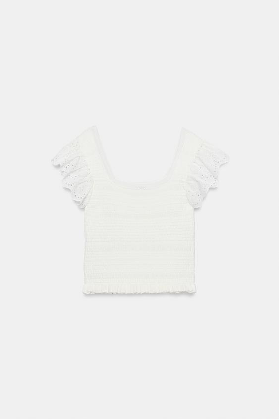 Top en maille à broderies ajourées