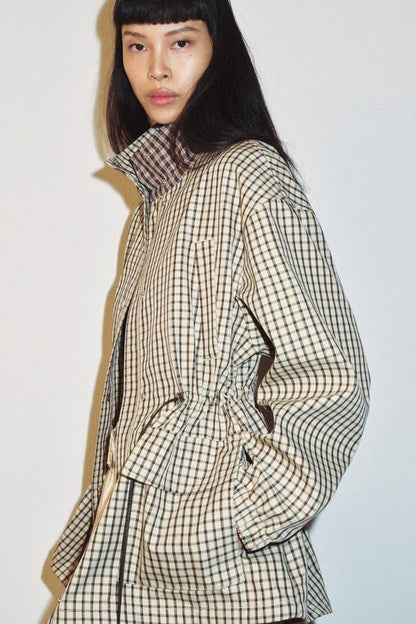 Veste à carreaux à col montant