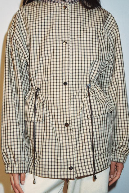 Veste à carreaux à col montant