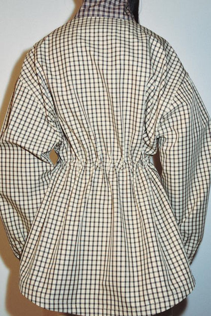 Veste à carreaux à col montant
