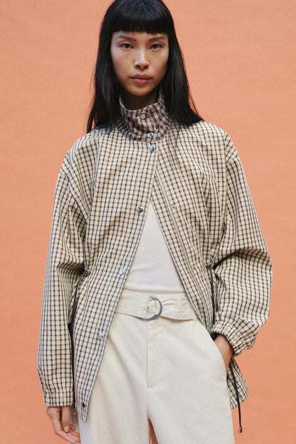 Veste à carreaux à col montant