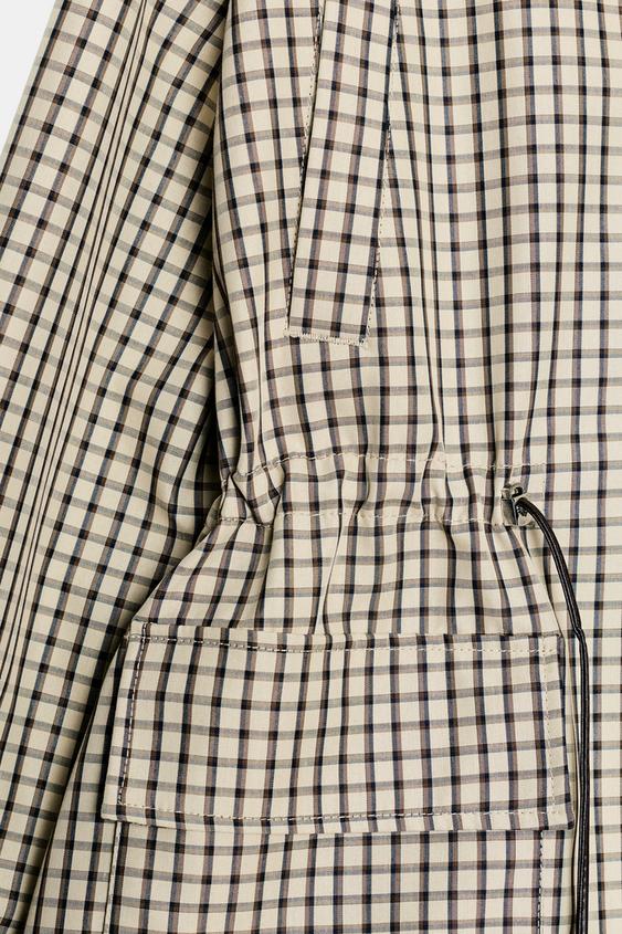 Veste à carreaux à col montant