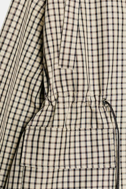 Veste à carreaux à col montant