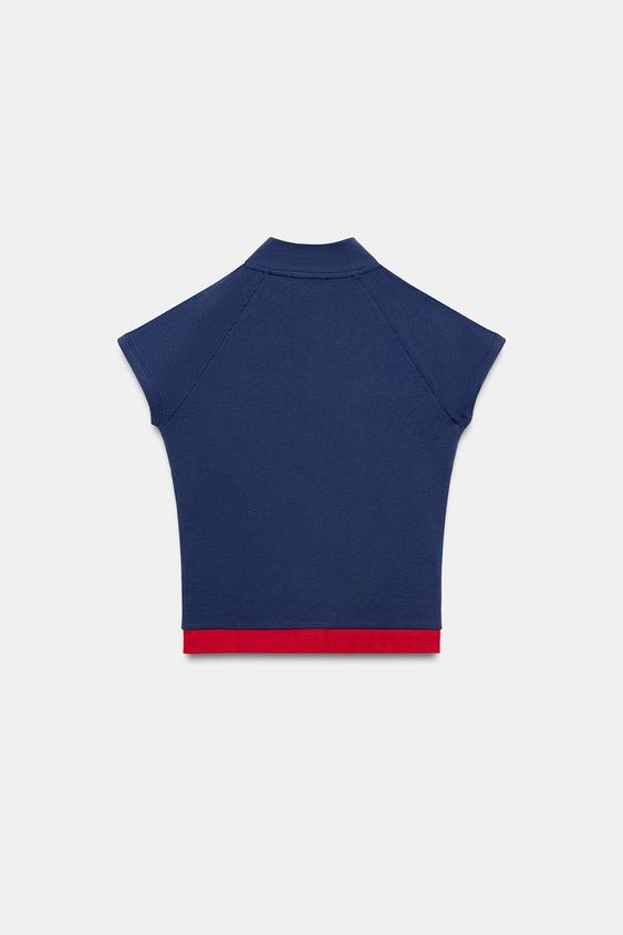 Top à fermeture zippée et texte