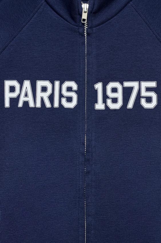 Top à fermeture zippée et texte