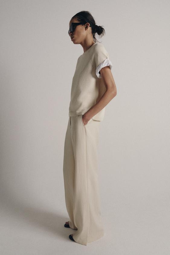 Pull en maille à manches contrastées avec revers