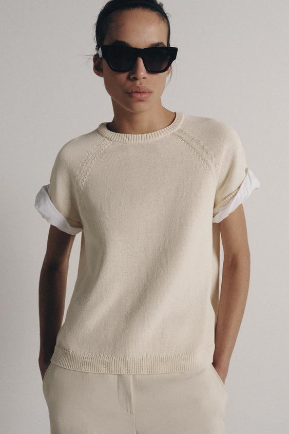 Pull en maille à manches contrastées avec revers