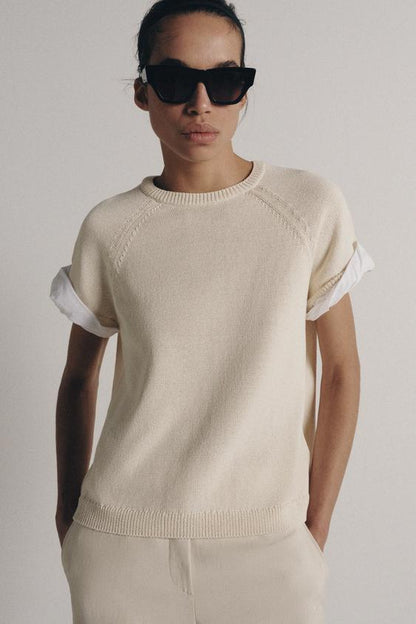 Pull en maille à manches contrastées avec revers
