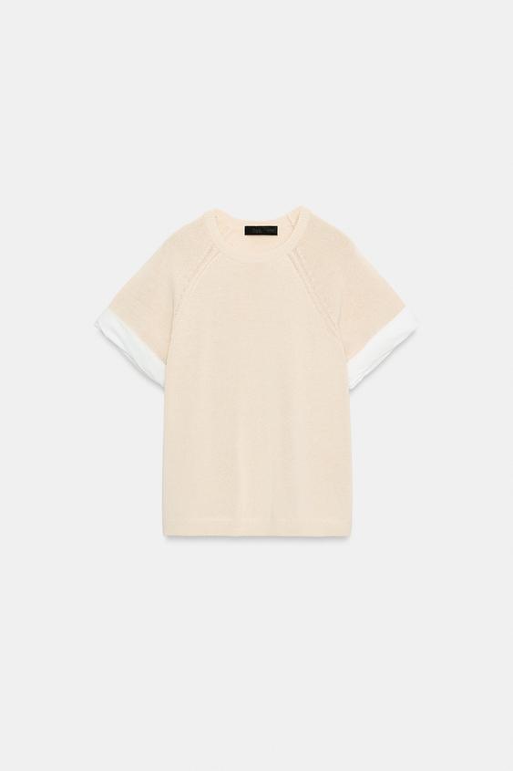 Pull en maille à manches contrastées avec revers