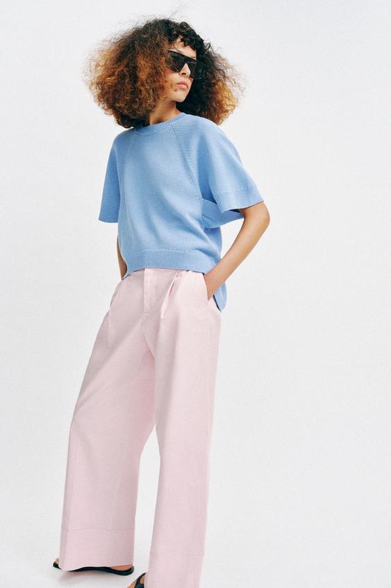 Pull en maille à bas arrondi et manches courtes