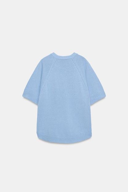 Pull en maille à bas arrondi et manches courtes