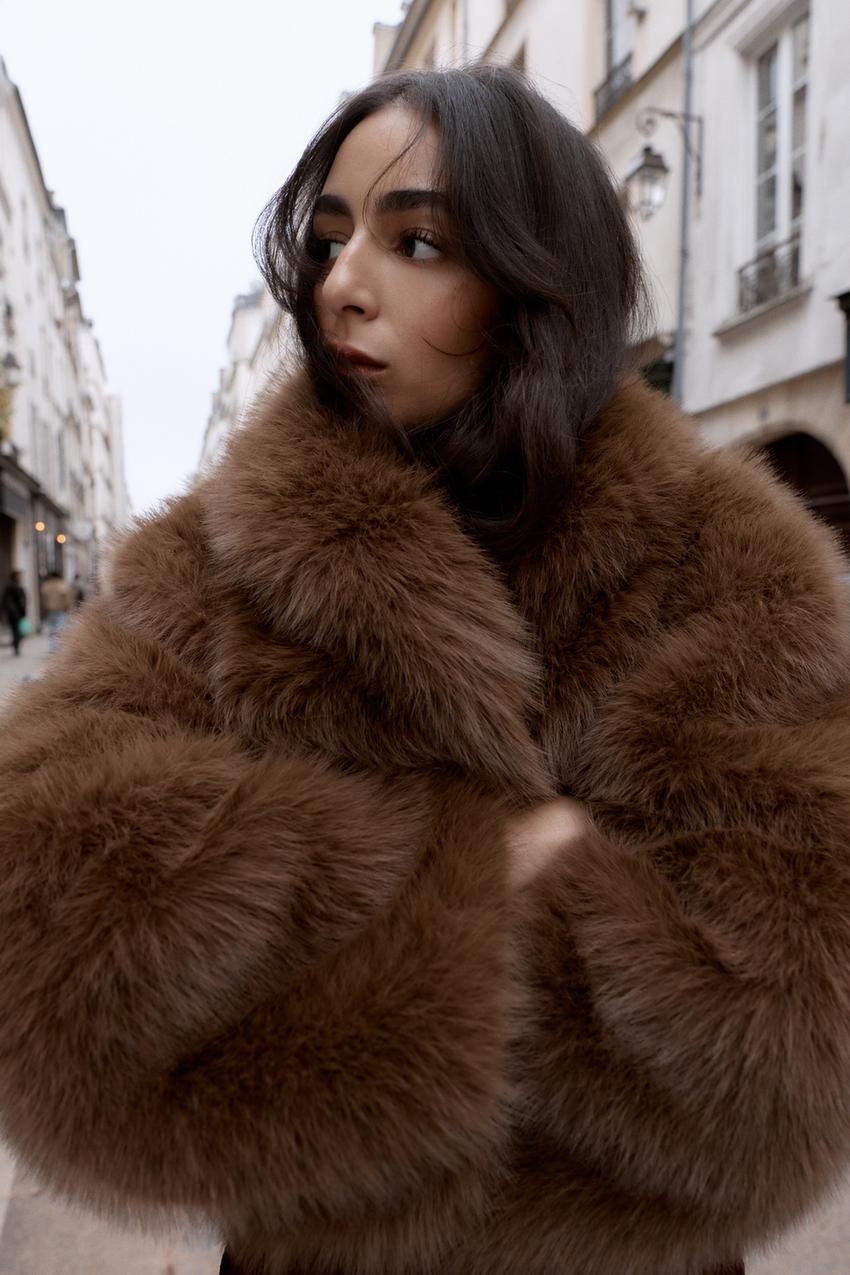 Manteau court effet fourrure