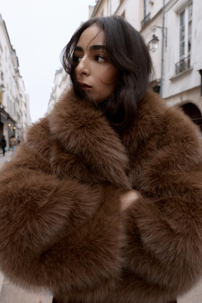 Manteau court effet fourrure