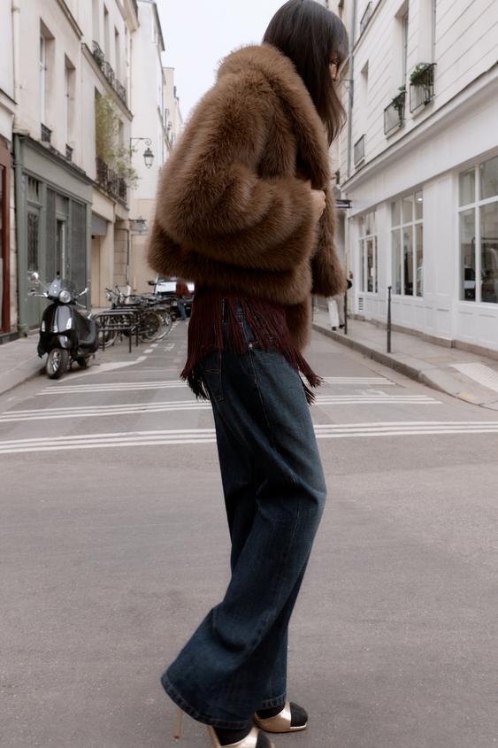 Manteau court effet fourrure