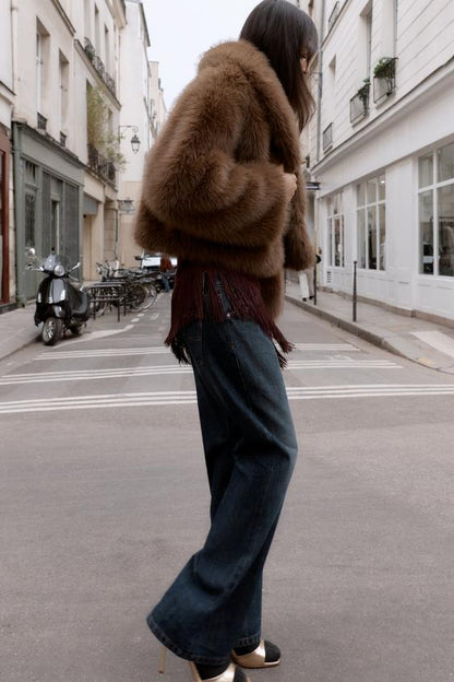 Manteau court effet fourrure