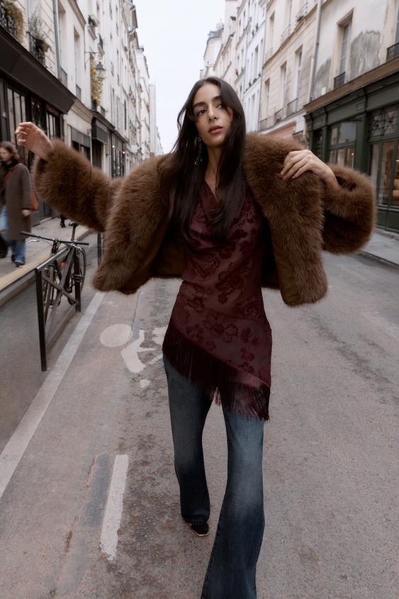 Manteau court effet fourrure