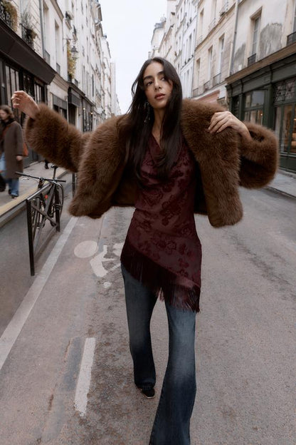 Manteau court effet fourrure