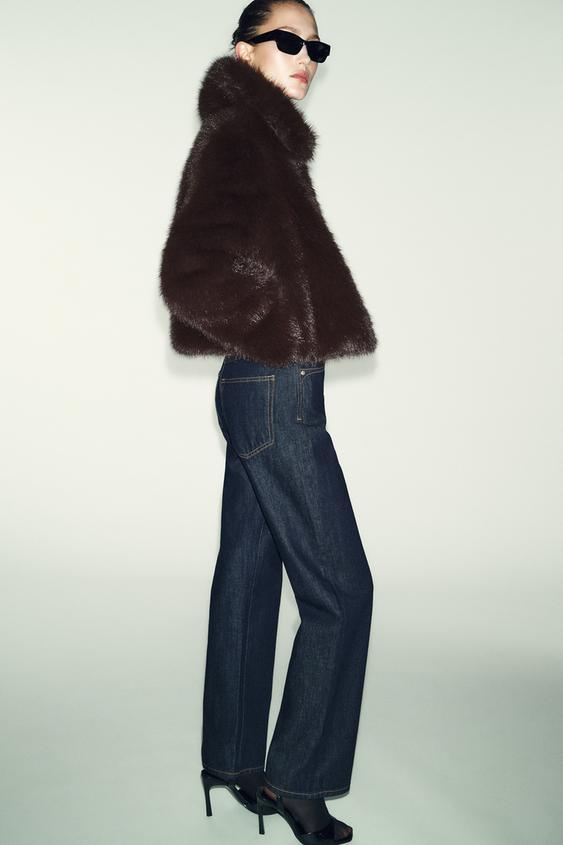 Manteau court effet fourrure à col revers